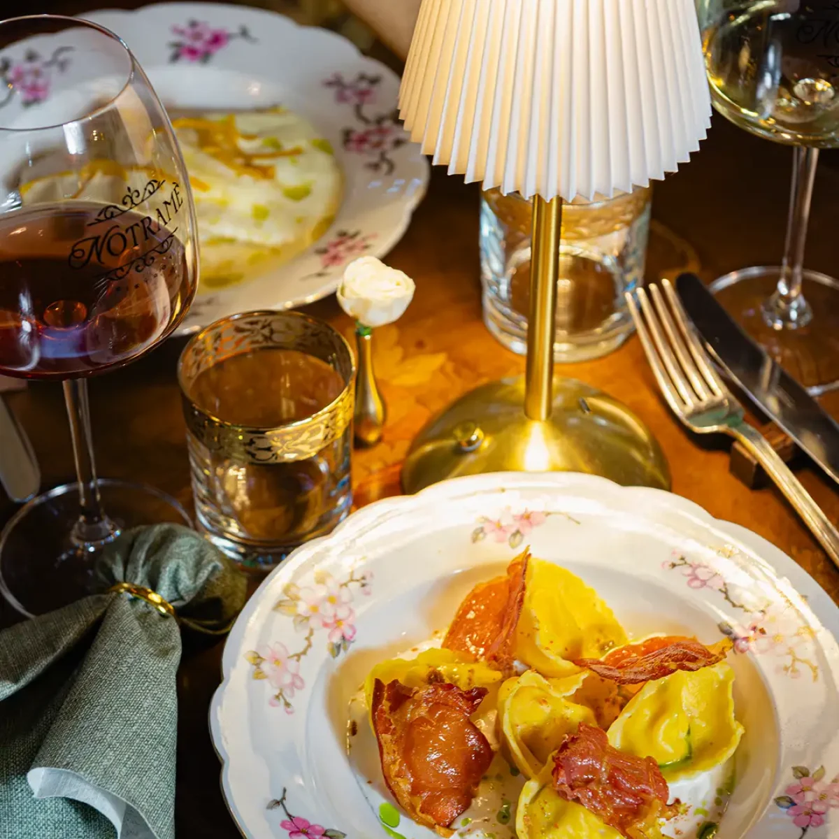 Table with fresh first course at the Notramè bistro in Monteverde, Rome.